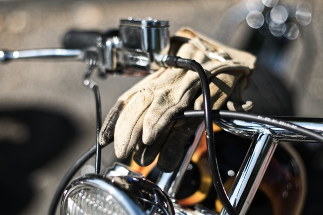 photo-of-a-glove-on-motorcycle-handlebar-1407130